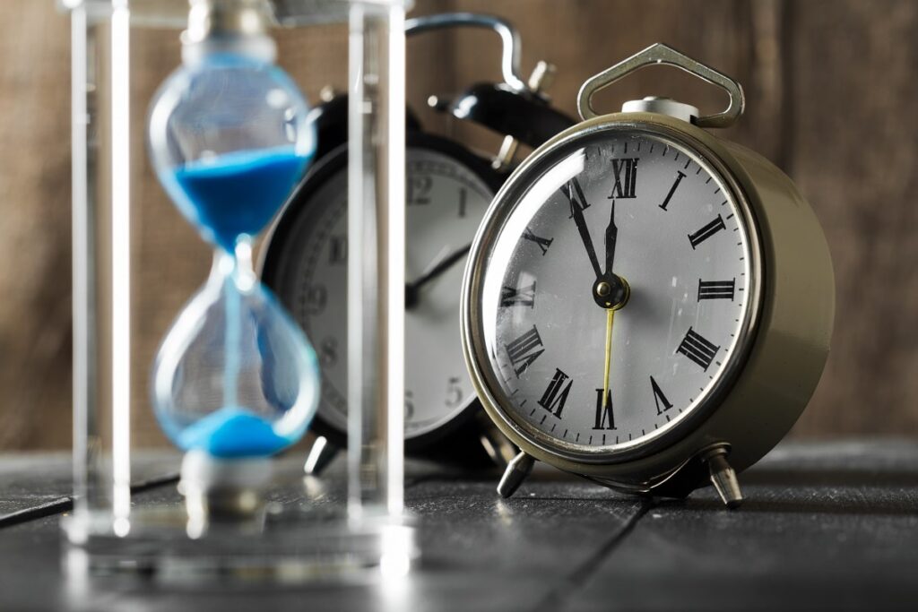 time-is-passing-blue-hourglass-min